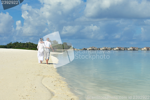 Image of happy young couple have fun on summer
