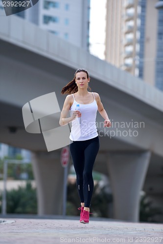 Image of woman jogging at morning