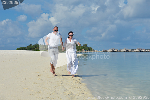 Image of happy young couple have fun on summer