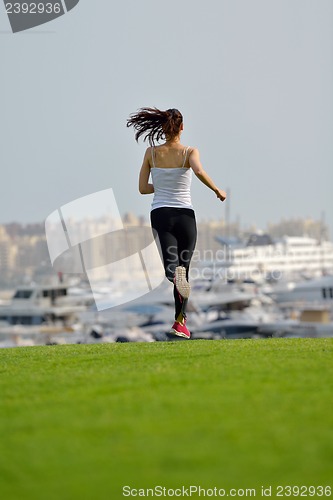 Image of woman jogging at morning