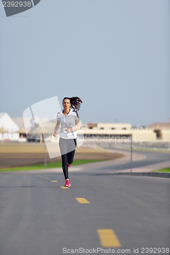 Image of woman jogging at morning