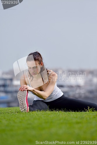 Image of Young beautiful  woman jogging  on morning