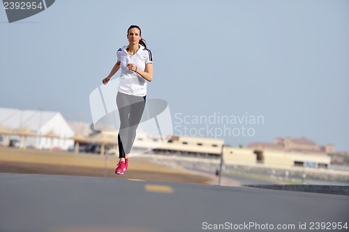 Image of woman jogging at morning