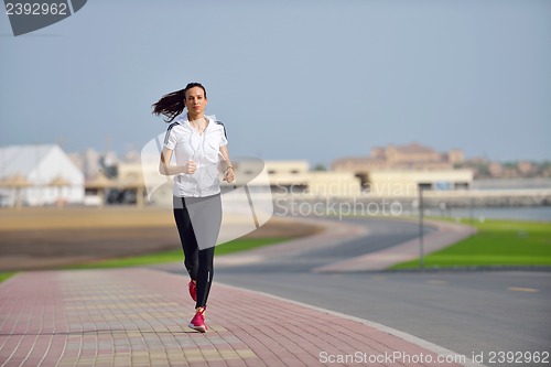 Image of woman jogging at morning
