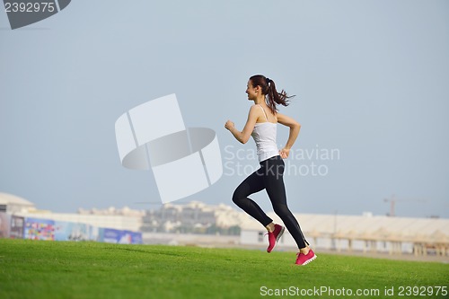 Image of woman jogging at morning