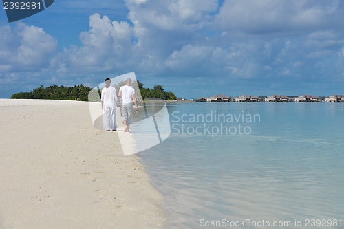 Image of happy young couple have fun on summer