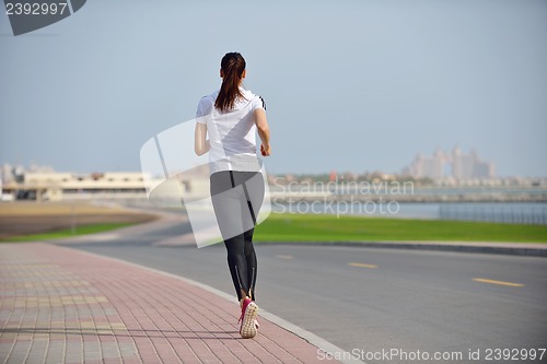 Image of woman jogging at morning