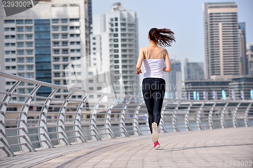 Image of woman jogging at morning