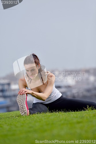 Image of Young beautiful  woman jogging  on morning