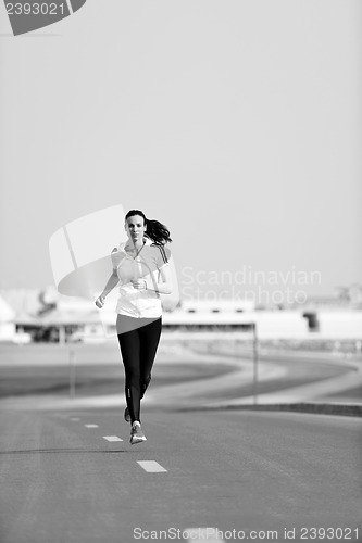 Image of woman jogging at morning