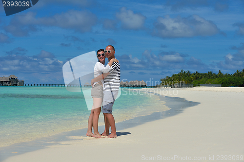 Image of happy young couple have fun on summer