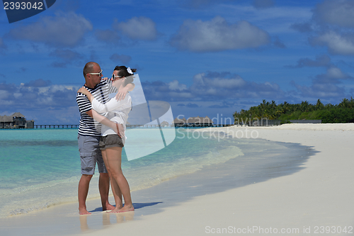 Image of happy young couple have fun on summer