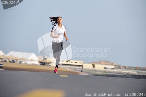 Image of woman jogging at morning