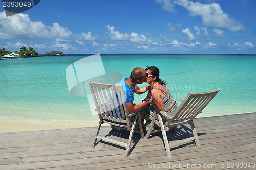 Image of happy young couple have fun on summer