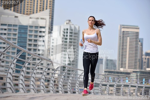 Image of woman jogging at morning