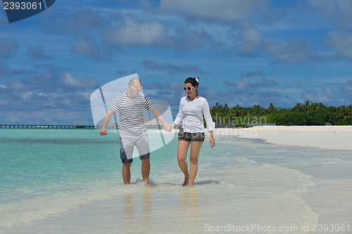 Image of happy young couple have fun on summer