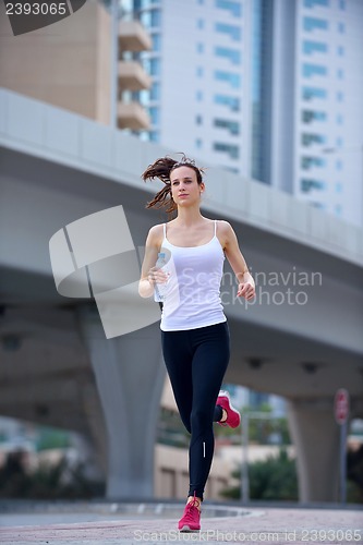 Image of woman jogging at morning