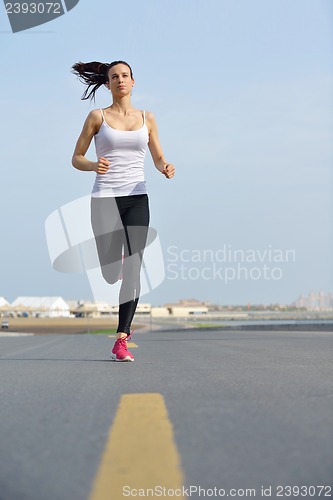 Image of woman jogging at morning