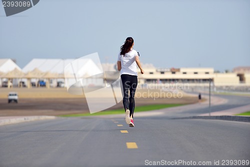 Image of woman jogging at morning