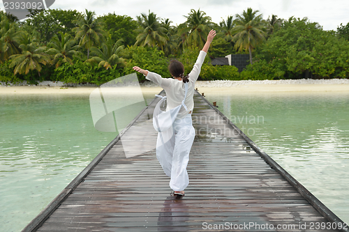 Image of young woman relax on cloudy summer day