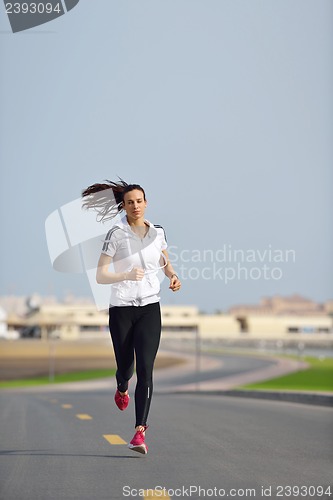 Image of woman jogging at morning