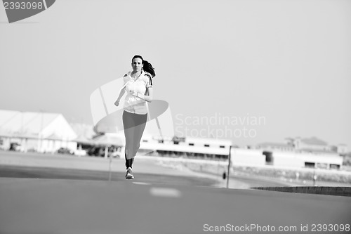 Image of woman jogging at morning