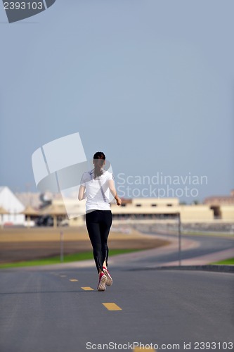 Image of woman jogging at morning