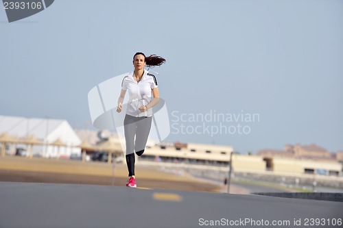 Image of woman jogging at morning