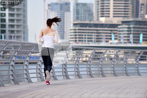 Image of woman jogging at morning