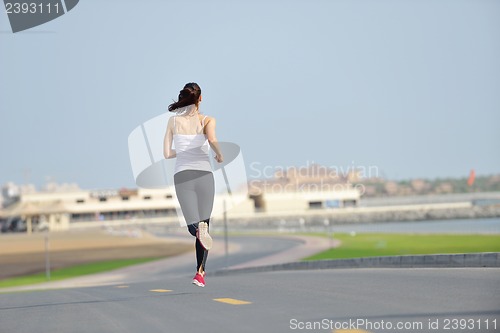 Image of woman jogging at morning