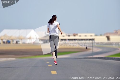Image of woman jogging at morning