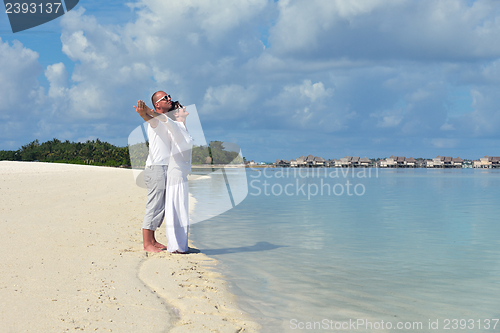 Image of happy young couple have fun on summer