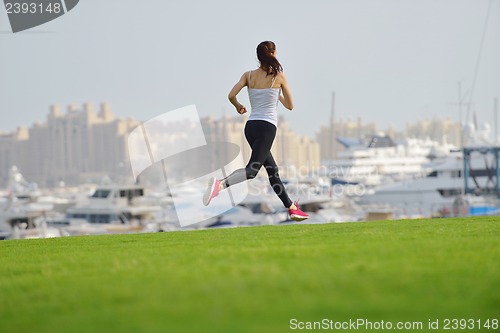 Image of woman jogging at morning