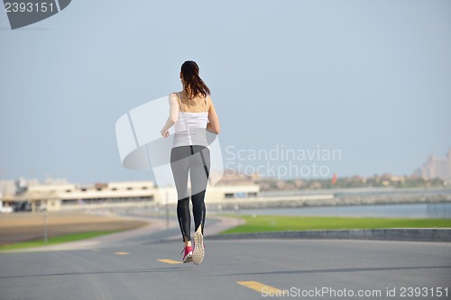 Image of woman jogging at morning