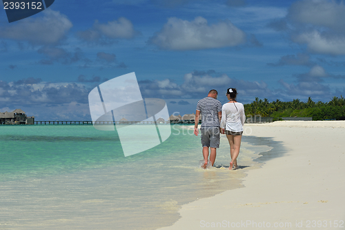 Image of happy young couple have fun on summer