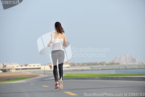 Image of woman jogging at morning