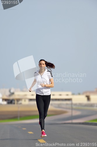 Image of woman jogging at morning