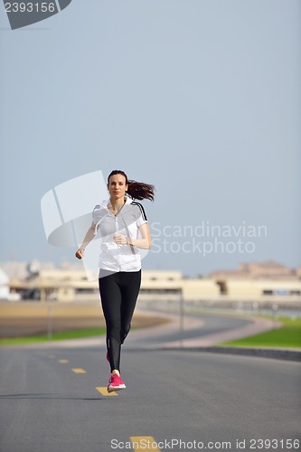 Image of woman jogging at morning