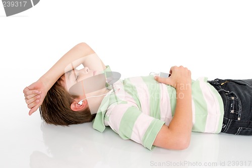 Image of Boy listening music