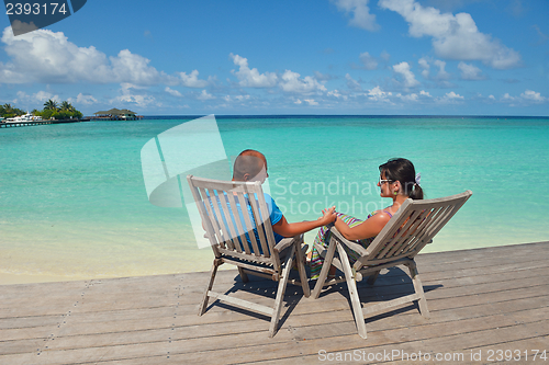 Image of happy young couple have fun on summer