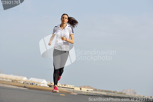 Image of woman jogging at morning
