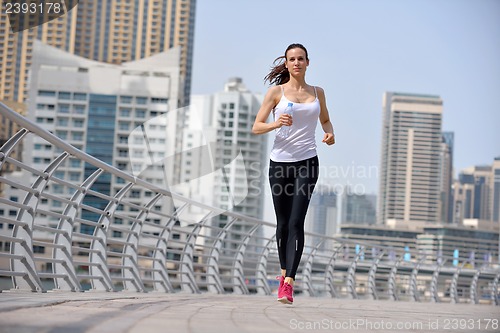 Image of woman jogging at morning
