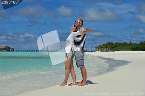 Image of happy young couple have fun on summer