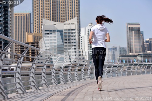 Image of woman jogging at morning