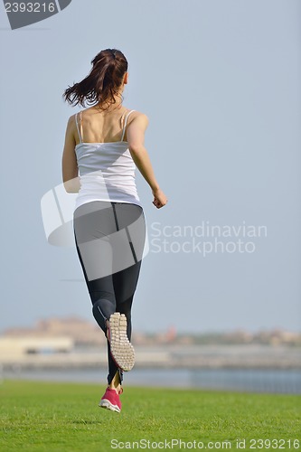 Image of woman jogging at morning