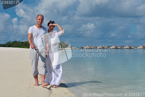 Image of happy young couple have fun on summer