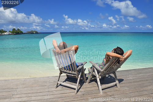 Image of happy young couple have fun on summer