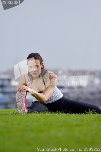 Image of Young beautiful  woman jogging  on morning