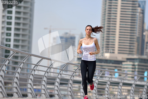 Image of woman jogging at morning