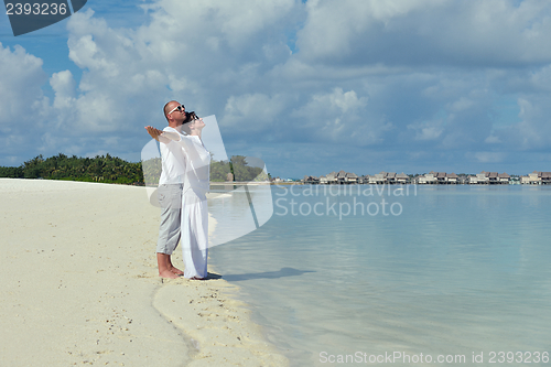 Image of happy young couple have fun on summer
